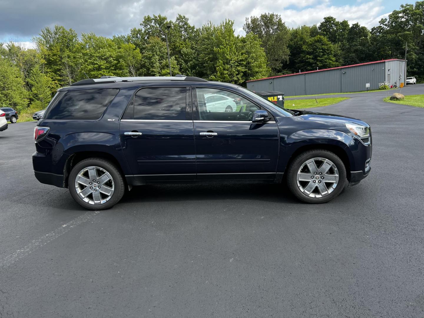 2017 Blue /Black GMC Acadia SLT-2 AWD (1GKKVSKD4HJ) with an 3.6L V6 DOHC 24V engine, 6-Speed Automatic transmission, located at 547 E. Main St., Orwell, OH, 44076, (440) 437-5893, 41.535435, -80.847855 - This 2017 GMC Acadia Limited SLT-2 AWD is a well-equipped midsize SUV offering a blend of comfort, performance, and advanced features. It boasts a powerful 3.6-liter V6 engine producing 281 horsepower, paired with a 6-speed automatic transmission and all-wheel drive. The vehicle offers a luxurious i - Photo#6