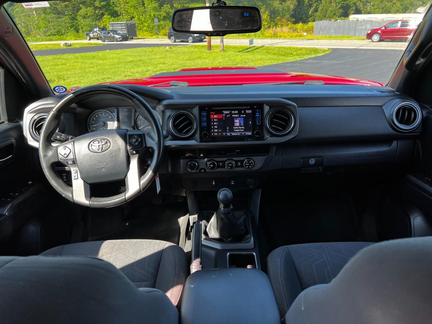 2016 Red /Black Toyota Tacoma TRD Sport Double Cab Short Bed V6 6M 4WD (5TFCZ5AN3GX) with an 3.6L V6 DOHC 24V engine, 6 Speed Manual transmission, located at 11115 Chardon Rd. , Chardon, OH, 44024, (440) 214-9705, 41.580246, -81.241943 - This 2016 Toyota Tacoma TRD Sport Double Cab is a well-equipped mid-size pickup truck that offers a blend of performance, technology, and utility. It features a powerful 3.5-liter Atkinson cycle V6 engine paired with a 6-speed manual transmission, providing a balance of power and efficiency with a h - Photo#38