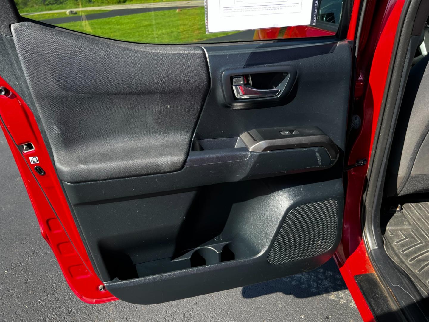 2016 Red /Black Toyota Tacoma TRD Sport Double Cab Short Bed V6 6M 4WD (5TFCZ5AN3GX) with an 3.6L V6 DOHC 24V engine, 6 Speed Manual transmission, located at 11115 Chardon Rd. , Chardon, OH, 44024, (440) 214-9705, 41.580246, -81.241943 - This 2016 Toyota Tacoma TRD Sport Double Cab is a well-equipped mid-size pickup truck that offers a blend of performance, technology, and utility. It features a powerful 3.5-liter Atkinson cycle V6 engine paired with a 6-speed manual transmission, providing a balance of power and efficiency with a h - Photo#36