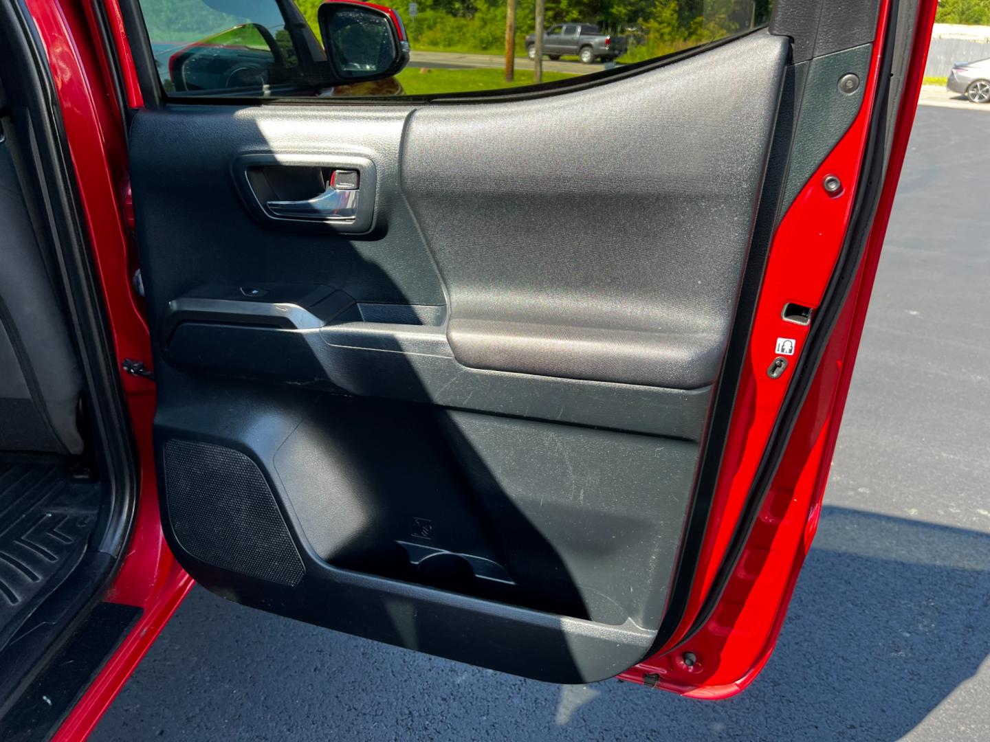 2016 Red /Black Toyota Tacoma TRD Sport Double Cab Short Bed V6 6M 4WD (5TFCZ5AN3GX) with an 3.6L V6 DOHC 24V engine, 6 Speed Manual transmission, located at 11115 Chardon Rd. , Chardon, OH, 44024, (440) 214-9705, 41.580246, -81.241943 - This 2016 Toyota Tacoma TRD Sport Double Cab is a well-equipped mid-size pickup truck that offers a blend of performance, technology, and utility. It features a powerful 3.5-liter Atkinson cycle V6 engine paired with a 6-speed manual transmission, providing a balance of power and efficiency with a h - Photo#40