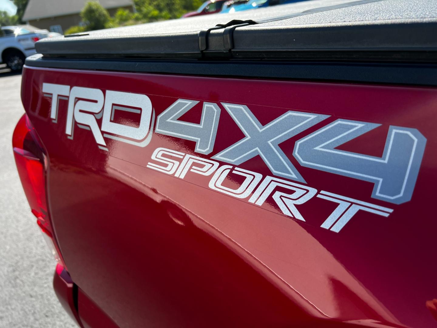 2016 Red /Black Toyota Tacoma TRD Sport Double Cab Short Bed V6 6M 4WD (5TFCZ5AN3GX) with an 3.6L V6 DOHC 24V engine, 6 Speed Manual transmission, located at 11115 Chardon Rd. , Chardon, OH, 44024, (440) 214-9705, 41.580246, -81.241943 - This 2016 Toyota Tacoma TRD Sport Double Cab is a well-equipped mid-size pickup truck that offers a blend of performance, technology, and utility. It features a powerful 3.5-liter Atkinson cycle V6 engine paired with a 6-speed manual transmission, providing a balance of power and efficiency with a h - Photo#13