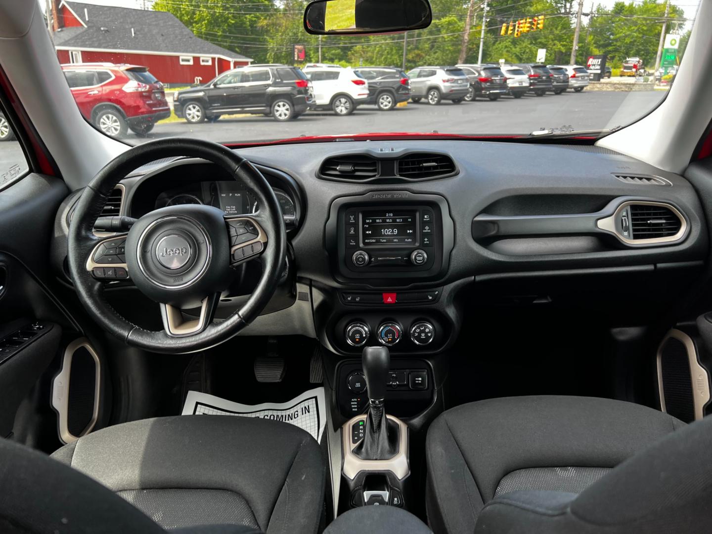 2017 Red /Black Jeep Renegade Latitude 4WD (ZACCJBBB8HP) with an 2.4L I4 DOHC 16V engine, 9-Speed Automatic transmission, located at 547 E. Main St., Orwell, OH, 44076, (440) 437-5893, 41.535435, -80.847855 - Photo#30