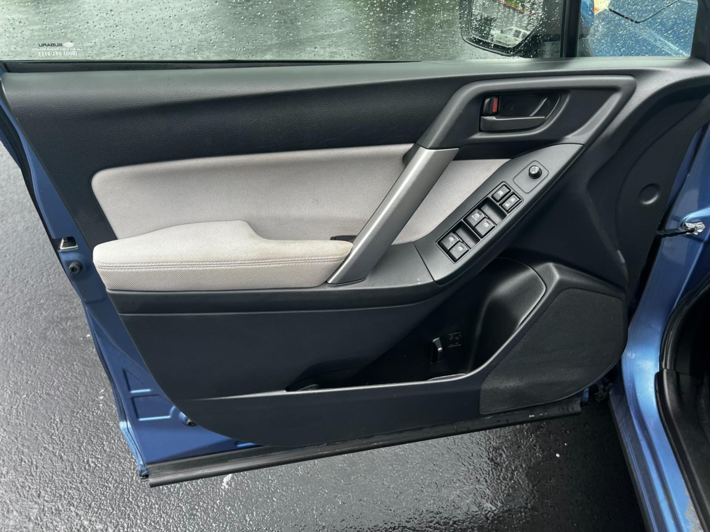 2015 Blue /Gray Subaru Forester 2.5i Premium (JF2SJADC1FH) with an 2.5L H4 SOHC 16V engine, Automatic transmission, located at 11115 Chardon Rd. , Chardon, OH, 44024, (440) 214-9705, 41.580246, -81.241943 - This One Owner 2015 Subaru Forester 2.5i Premium is a well-equipped compact SUV that combines practicality, comfort, and efficiency. It features a 2.5-liter horizontally-opposed four-cylinder engine paired with a Continuously Variable Transmission (CVT), offering smooth power delivery and good fuel - Photo#15