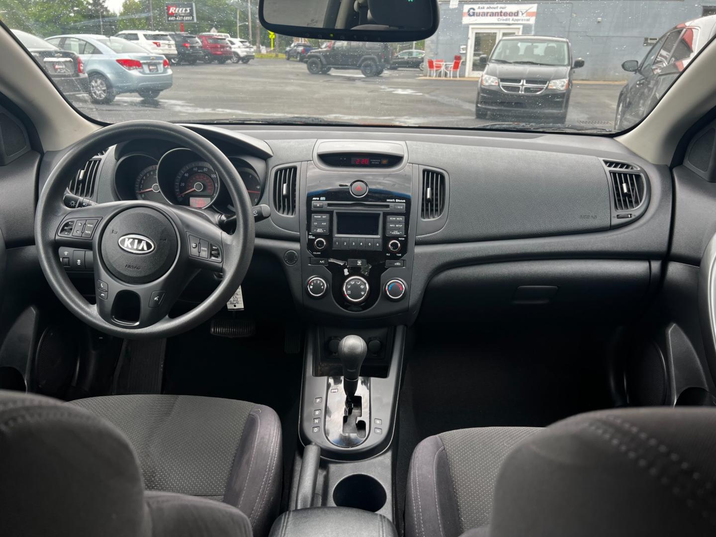 2010 Red /Black Kia Forte Koup EX (KNAFU6A29A5) with an 2.0L I4 DOHC 16V engine, 4 Speed Auto transmission, located at 547 E. Main St., Orwell, OH, 44076, (440) 437-5893, 41.535435, -80.847855 - Photo#25