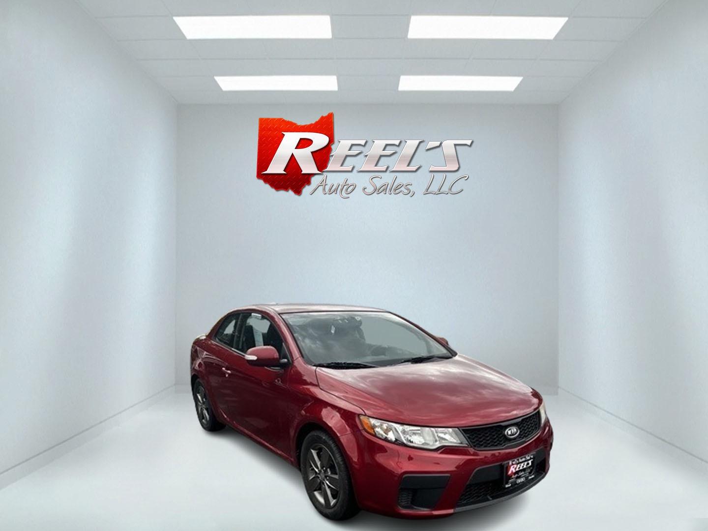 2010 Red /Black Kia Forte Koup EX (KNAFU6A29A5) with an 2.0L I4 DOHC 16V engine, 4 Speed Auto transmission, located at 547 E. Main St., Orwell, OH, 44076, (440) 437-5893, 41.535435, -80.847855 - Photo#2
