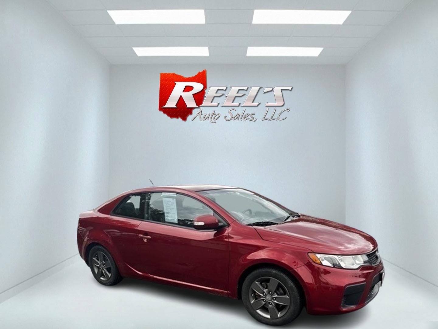 2010 Red /Black Kia Forte Koup EX (KNAFU6A29A5) with an 2.0L I4 DOHC 16V engine, 4 Speed Auto transmission, located at 547 E. Main St., Orwell, OH, 44076, (440) 437-5893, 41.535435, -80.847855 - Photo#3