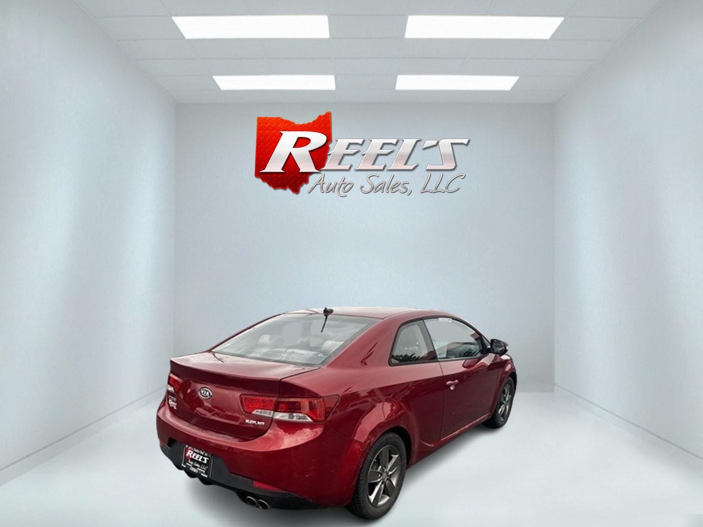 2010 Red /Black Kia Forte Koup EX (KNAFU6A29A5) with an 2.0L I4 DOHC 16V engine, 4 Speed Auto transmission, located at 547 E. Main St., Orwell, OH, 44076, (440) 437-5893, 41.535435, -80.847855 - Photo#5