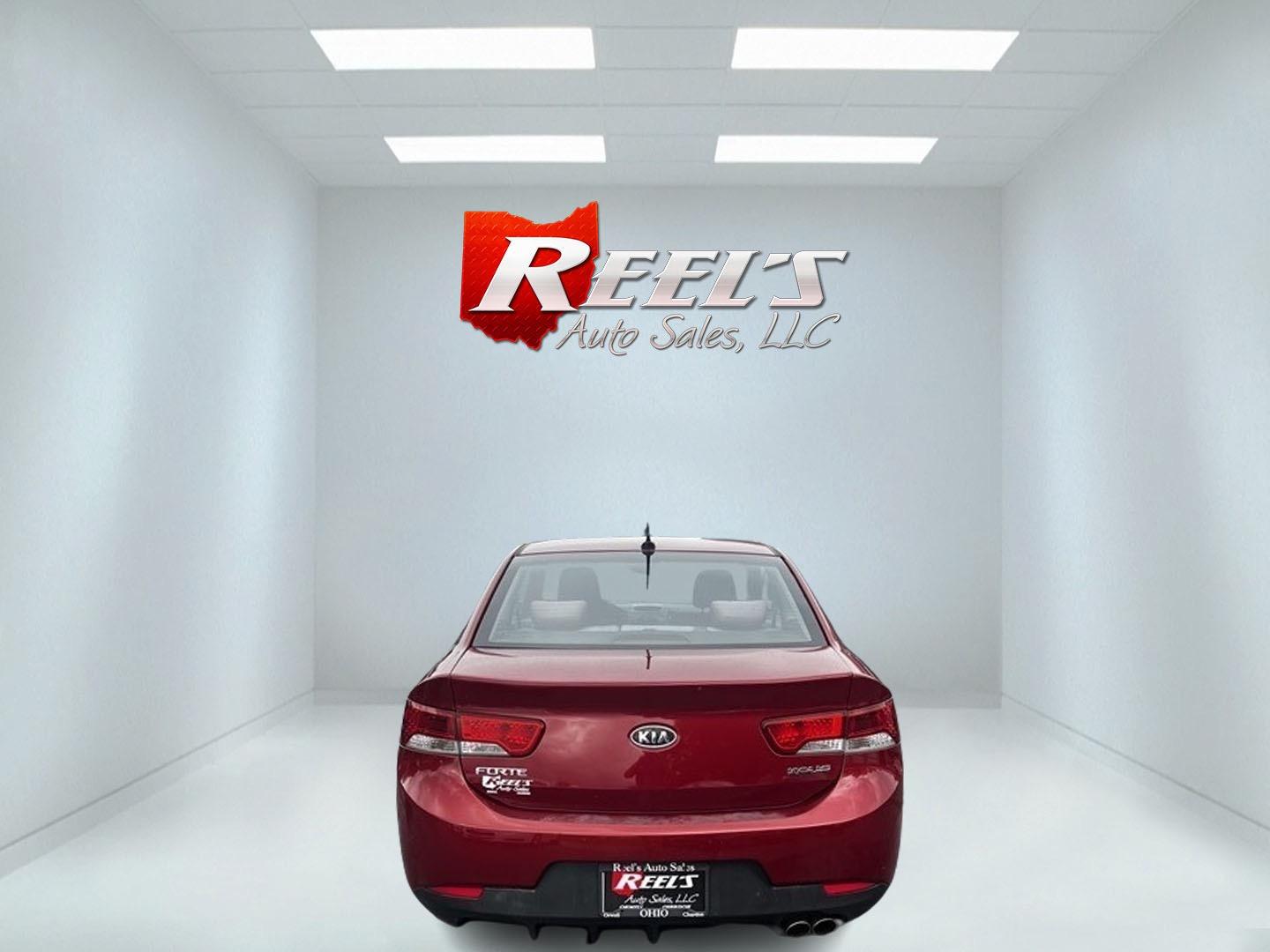 2010 Red /Black Kia Forte Koup EX (KNAFU6A29A5) with an 2.0L I4 DOHC 16V engine, 4 Speed Auto transmission, located at 547 E. Main St., Orwell, OH, 44076, (440) 437-5893, 41.535435, -80.847855 - Photo#6