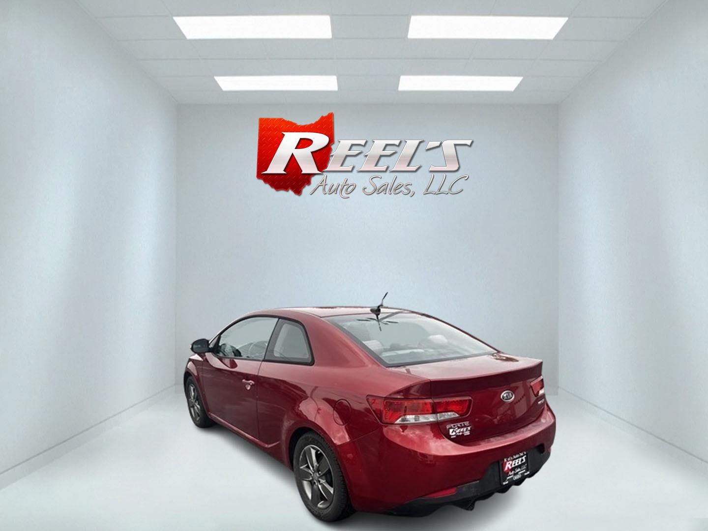 2010 Red /Black Kia Forte Koup EX (KNAFU6A29A5) with an 2.0L I4 DOHC 16V engine, 4 Speed Auto transmission, located at 547 E. Main St., Orwell, OH, 44076, (440) 437-5893, 41.535435, -80.847855 - Photo#7