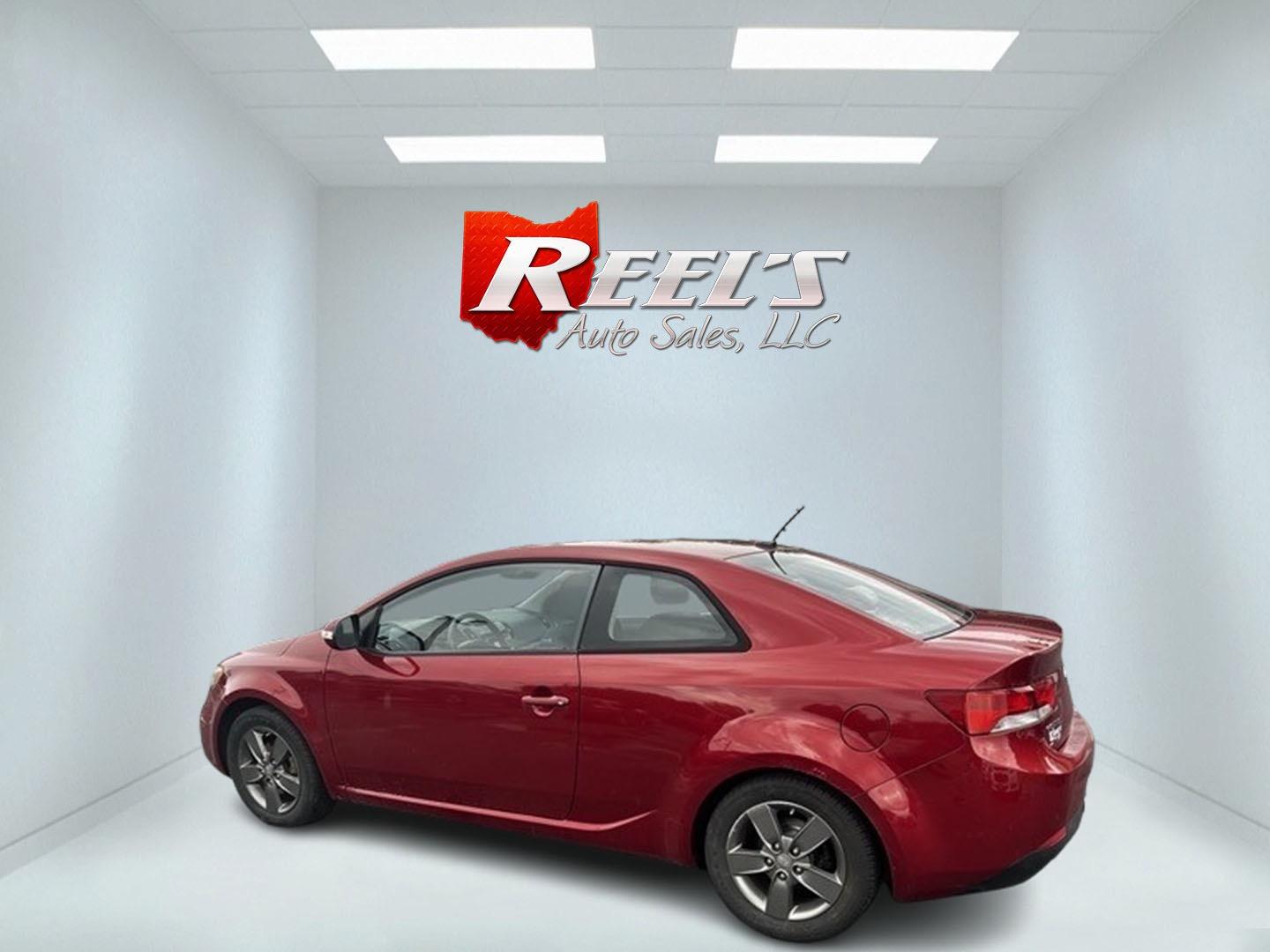 2010 Red /Black Kia Forte Koup EX (KNAFU6A29A5) with an 2.0L I4 DOHC 16V engine, 4 Speed Auto transmission, located at 547 E. Main St., Orwell, OH, 44076, (440) 437-5893, 41.535435, -80.847855 - Photo#8