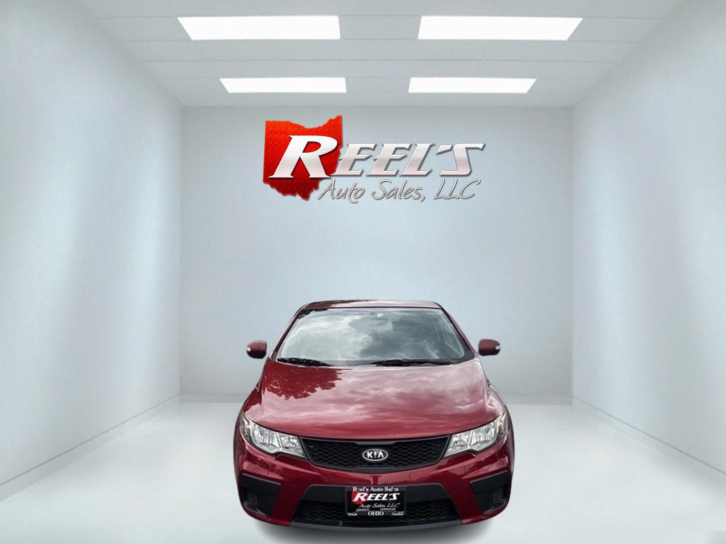2010 Red /Black Kia Forte Koup EX (KNAFU6A29A5) with an 2.0L I4 DOHC 16V engine, 4 Speed Auto transmission, located at 547 E. Main St., Orwell, OH, 44076, (440) 437-5893, 41.535435, -80.847855 - Photo#1
