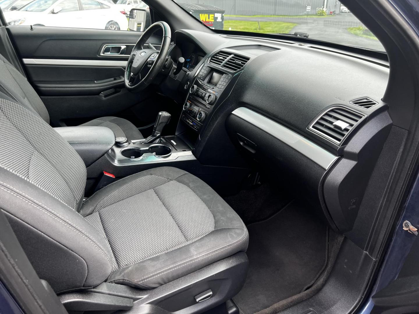 2017 Blue /Black Ford Explorer XLT 4WD (1FM5K8DH4HG) with an 2.3L I4 DOHC 16V Turbo engine, 6 Speed Auto transmission, located at 547 E. Main St., Orwell, OH, 44076, (440) 437-5893, 41.535435, -80.847855 - This 2017 Ford Explorer XLT 4WD is a capable and efficient midsize SUV. It's powered by a 2.3-liter turbocharged EcoBoost four-cylinder engine, paired with a 6-speed automatic transmission. This powertrain offers a balance of performance and efficiency, achieving 25 MPG on the highway while still pr - Photo#40