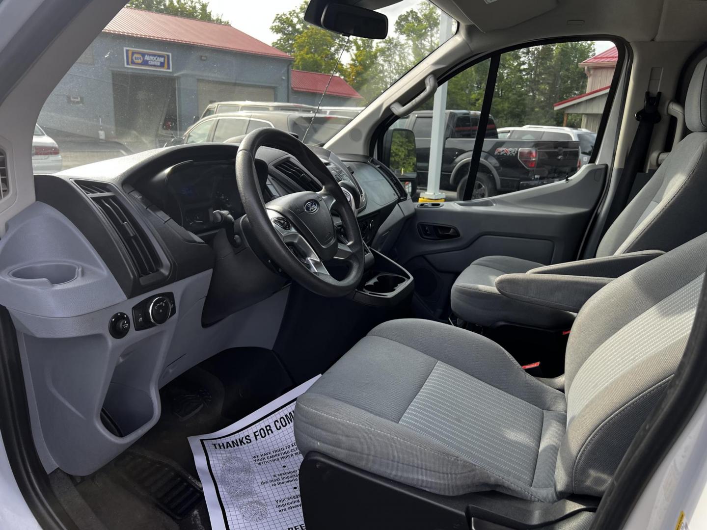 2016 White /Black Ford Transit 350 Wagon Low Roof XLT 60/40 Pass. 148-in. WB (1FBZX2ZM6GK) with an 3.7L V6 DOHC 24V engine, 6 Speed Auto transmission, located at 547 E. Main St., Orwell, OH, 44076, (440) 437-5893, 41.535435, -80.847855 - This 2016 Ford Transit T-350 XLT Wagon is a versatile 13-passenger van equipped with a 3.7-liter V6 engine and a 6-speed automatic transmission. This model offers a comfortable ride with front and rear climate zones and features modern conveniences such as HD radio, and dusk-sensing headlights. Safe - Photo#16