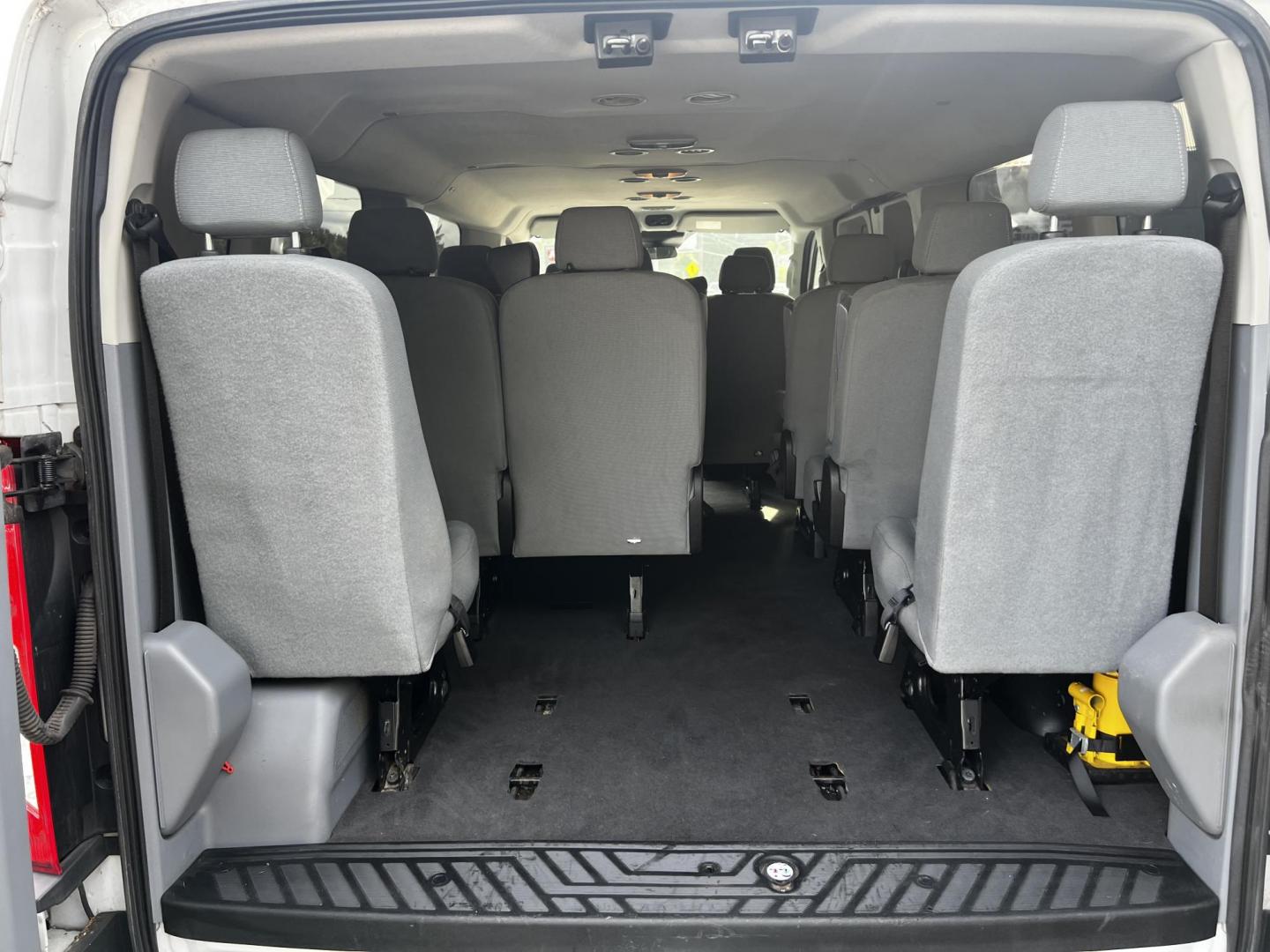 2016 White /Black Ford Transit 350 Wagon Low Roof XLT 60/40 Pass. 148-in. WB (1FBZX2ZM6GK) with an 3.7L V6 DOHC 24V engine, 6 Speed Auto transmission, located at 547 E. Main St., Orwell, OH, 44076, (440) 437-5893, 41.535435, -80.847855 - This 2016 Ford Transit T-350 XLT Wagon is a versatile 13-passenger van equipped with a 3.7-liter V6 engine and a 6-speed automatic transmission. This model offers a comfortable ride with front and rear climate zones and features modern conveniences such as HD radio, and dusk-sensing headlights. Safe - Photo#29