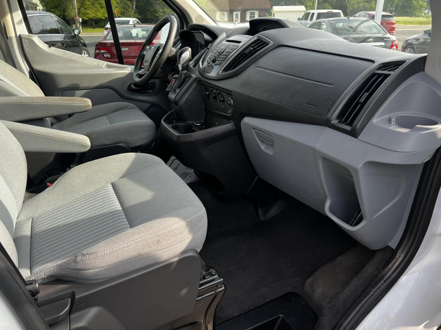 2016 White /Black Ford Transit 350 Wagon Low Roof XLT 60/40 Pass. 148-in. WB (1FBZX2ZM6GK) with an 3.7L V6 DOHC 24V engine, 6 Speed Auto transmission, located at 547 E. Main St., Orwell, OH, 44076, (440) 437-5893, 41.535435, -80.847855 - This 2016 Ford Transit T-350 XLT Wagon is a versatile 13-passenger van equipped with a 3.7-liter V6 engine and a 6-speed automatic transmission. This model offers a comfortable ride with front and rear climate zones and features modern conveniences such as HD radio, and dusk-sensing headlights. Safe - Photo#33