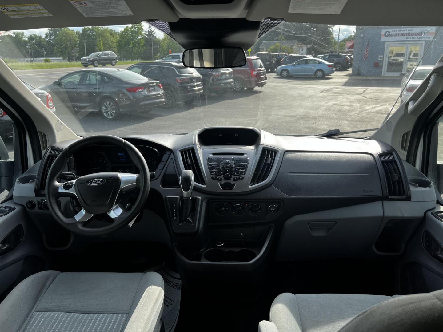 2016 White /Black Ford Transit 350 Wagon Low Roof XLT 60/40 Pass. 148-in. WB (1FBZX2ZM6GK) with an 3.7L V6 DOHC 24V engine, 6 Speed Auto transmission, located at 547 E. Main St., Orwell, OH, 44076, (440) 437-5893, 41.535435, -80.847855 - This 2016 Ford Transit T-350 XLT Wagon is a versatile 13-passenger van equipped with a 3.7-liter V6 engine and a 6-speed automatic transmission. This model offers a comfortable ride with front and rear climate zones and features modern conveniences such as HD radio, and dusk-sensing headlights. Safe - Photo#35