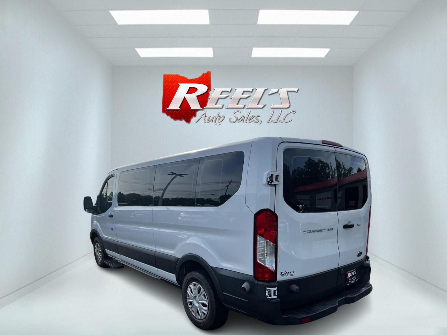 2016 White /Black Ford Transit 350 Wagon Low Roof XLT 60/40 Pass. 148-in. WB (1FBZX2ZM6GK) with an 3.7L V6 DOHC 24V engine, 6 Speed Auto transmission, located at 547 E. Main St., Orwell, OH, 44076, (440) 437-5893, 41.535435, -80.847855 - This 2016 Ford Transit T-350 XLT Wagon is a versatile 13-passenger van equipped with a 3.7-liter V6 engine and a 6-speed automatic transmission. This model offers a comfortable ride with front and rear climate zones and features modern conveniences such as HD radio, and dusk-sensing headlights. Safe - Photo#7