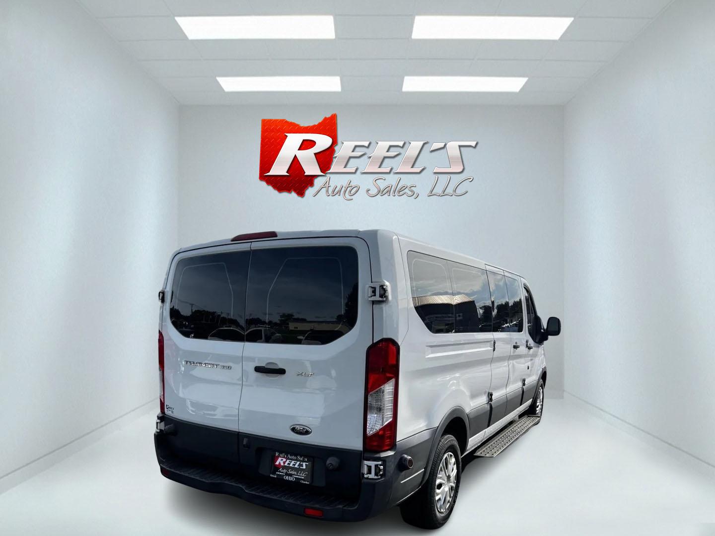 2016 White /Black Ford Transit 350 Wagon Low Roof XLT 60/40 Pass. 148-in. WB (1FBZX2ZM6GK) with an 3.7L V6 DOHC 24V engine, 6 Speed Auto transmission, located at 547 E. Main St., Orwell, OH, 44076, (440) 437-5893, 41.535435, -80.847855 - This 2016 Ford Transit T-350 XLT Wagon is a versatile 13-passenger van equipped with a 3.7-liter V6 engine and a 6-speed automatic transmission. This model offers a comfortable ride with front and rear climate zones and features modern conveniences such as HD radio, and dusk-sensing headlights. Safe - Photo#5