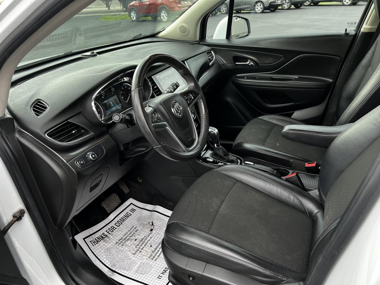 2017 White /Black Buick Encore Preferred FWD (KL4CJASB9HB) with an 1.4L I4 DOHC 16V TURBO engine, 6A transmission, located at 11115 Chardon Rd. , Chardon, OH, 44024, (440) 214-9705, 41.580246, -81.241943 - This 2017 Buick Encore Preferred FWD is a compact SUV fitted with a 1.4-liter Turbocharged I4 EcoTec engine and a 6-speed automatic transmission, offering practicality and efficiency with 33 MPG highway. It features modern conveniences such as a 8-inch touchscreen, Apple CarPlay, Android Auto, heate - Photo#15