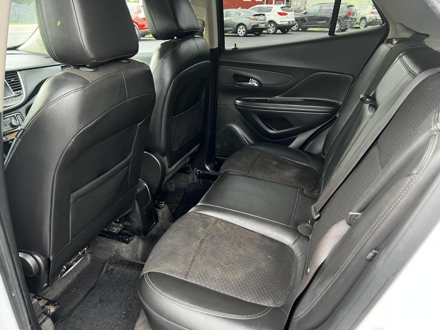 2017 White /Black Buick Encore Preferred FWD (KL4CJASB9HB) with an 1.4L I4 DOHC 16V TURBO engine, 6A transmission, located at 11115 Chardon Rd. , Chardon, OH, 44024, (440) 214-9705, 41.580246, -81.241943 - This 2017 Buick Encore Preferred FWD is a compact SUV fitted with a 1.4-liter Turbocharged I4 EcoTec engine and a 6-speed automatic transmission, offering practicality and efficiency with 33 MPG highway. It features modern conveniences such as a 8-inch touchscreen, Apple CarPlay, Android Auto, heate - Photo#31