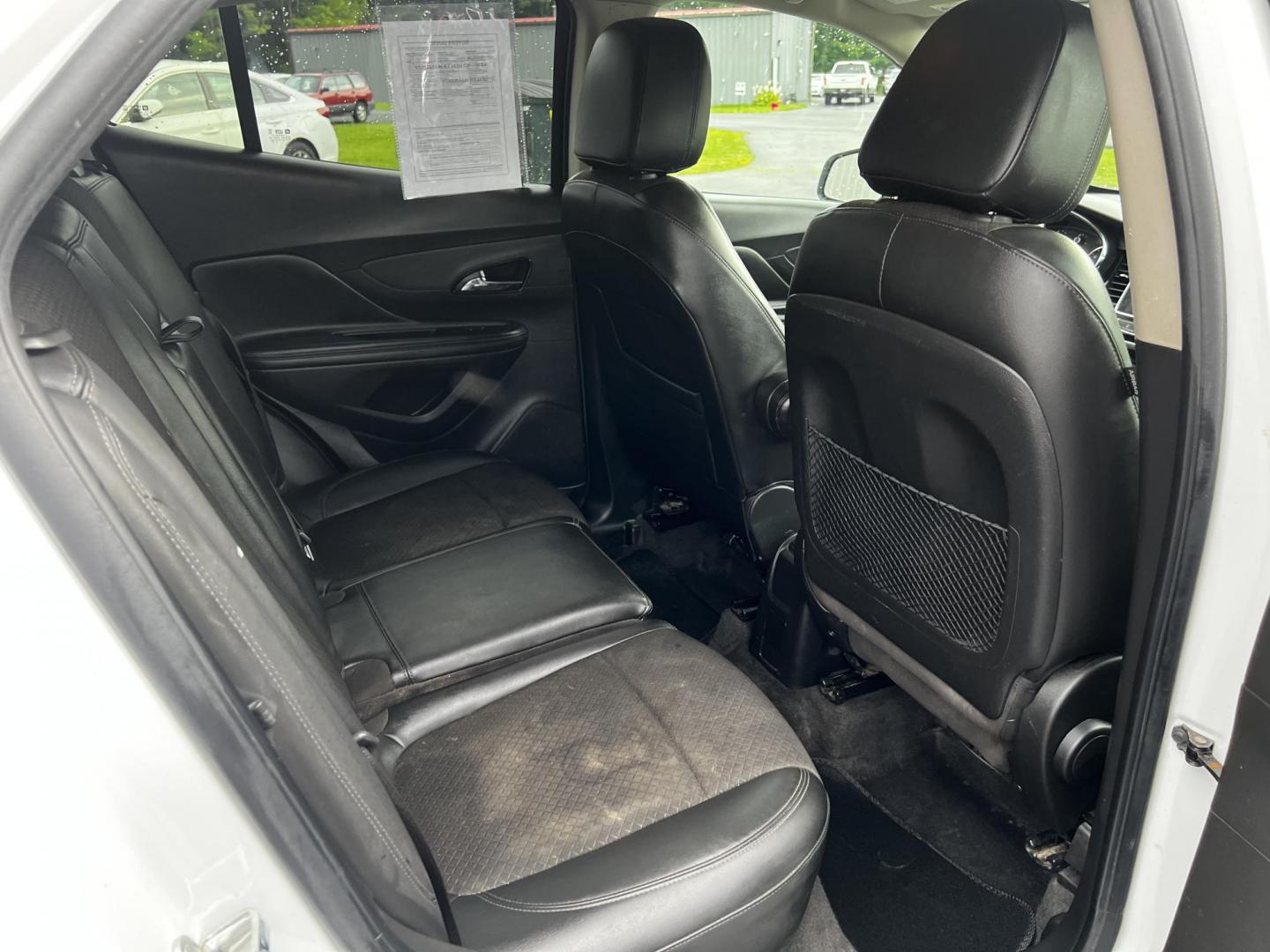 2017 White /Black Buick Encore Preferred FWD (KL4CJASB9HB) with an 1.4L I4 DOHC 16V TURBO engine, 6A transmission, located at 11115 Chardon Rd. , Chardon, OH, 44024, (440) 214-9705, 41.580246, -81.241943 - This 2017 Buick Encore Preferred FWD is a compact SUV fitted with a 1.4-liter Turbocharged I4 EcoTec engine and a 6-speed automatic transmission, offering practicality and efficiency with 33 MPG highway. It features modern conveniences such as a 8-inch touchscreen, Apple CarPlay, Android Auto, heate - Photo#36