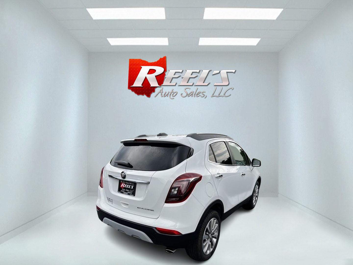 2017 White /Black Buick Encore Preferred FWD (KL4CJASB9HB) with an 1.4L I4 DOHC 16V TURBO engine, 6A transmission, located at 11115 Chardon Rd. , Chardon, OH, 44024, (440) 214-9705, 41.580246, -81.241943 - This 2017 Buick Encore Preferred FWD is a compact SUV fitted with a 1.4-liter Turbocharged I4 EcoTec engine and a 6-speed automatic transmission, offering practicality and efficiency with 33 MPG highway. It features modern conveniences such as a 8-inch touchscreen, Apple CarPlay, Android Auto, heate - Photo#5