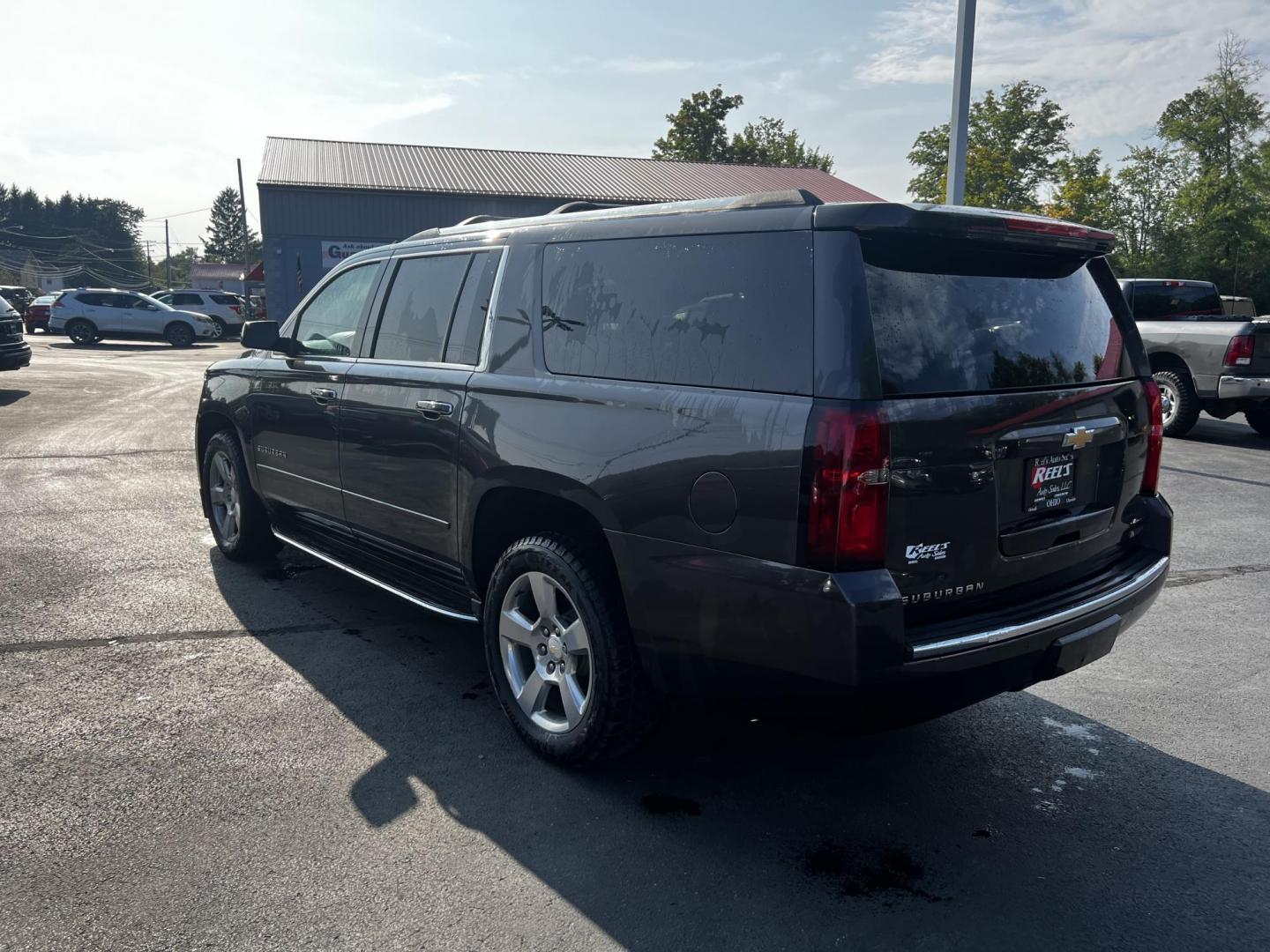 2017 Gray /Black Chevrolet Suburban Premier 4WD (1GNSKJKCXHR) with an 5.3L V8 OHV 16V engine, 6-Speed Automatic transmission, located at 547 E. Main St., Orwell, OH, 44076, (440) 437-5893, 41.535435, -80.847855 - Photo#11