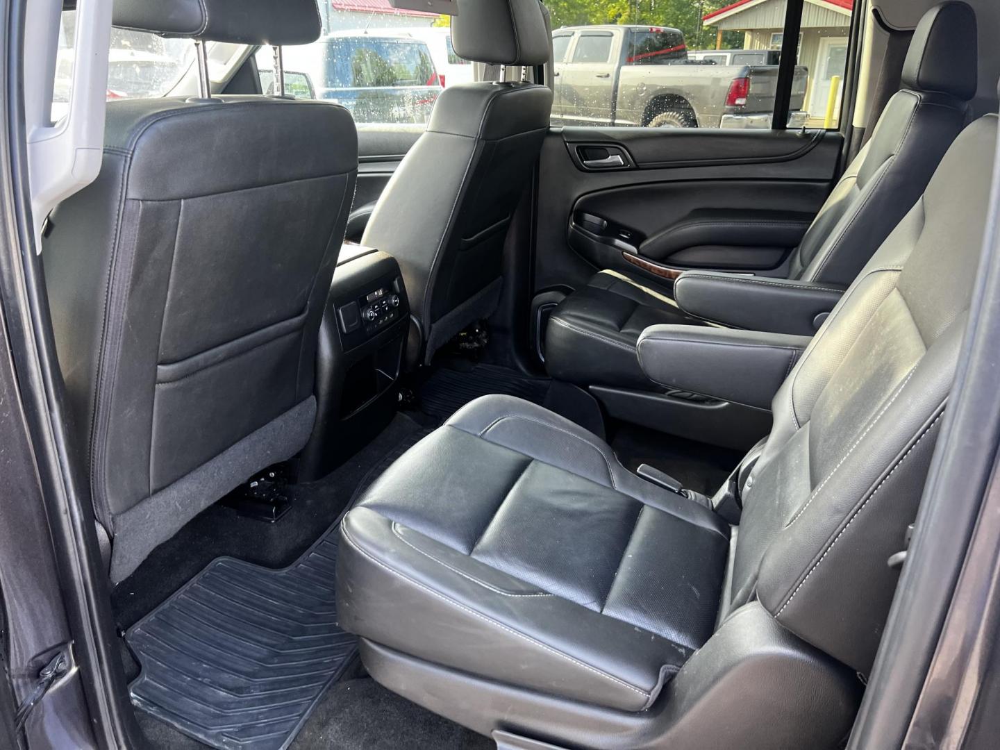 2017 Gray /Black Chevrolet Suburban Premier 4WD (1GNSKJKCXHR) with an 5.3L V8 OHV 16V engine, 6-Speed Automatic transmission, located at 547 E. Main St., Orwell, OH, 44076, (440) 437-5893, 41.535435, -80.847855 - Photo#42