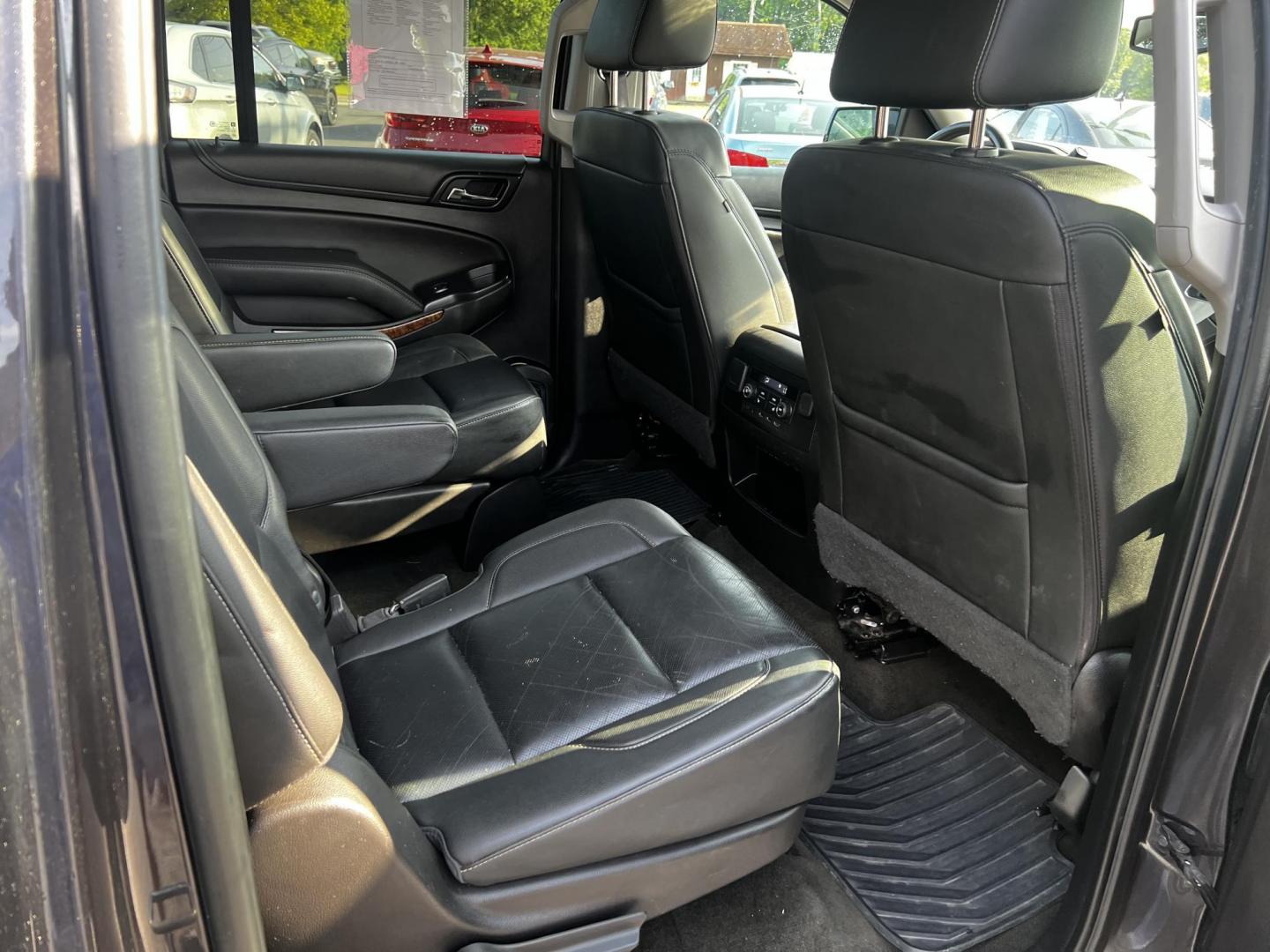2017 Gray /Black Chevrolet Suburban Premier 4WD (1GNSKJKCXHR) with an 5.3L V8 OHV 16V engine, 6-Speed Automatic transmission, located at 547 E. Main St., Orwell, OH, 44076, (440) 437-5893, 41.535435, -80.847855 - Photo#52