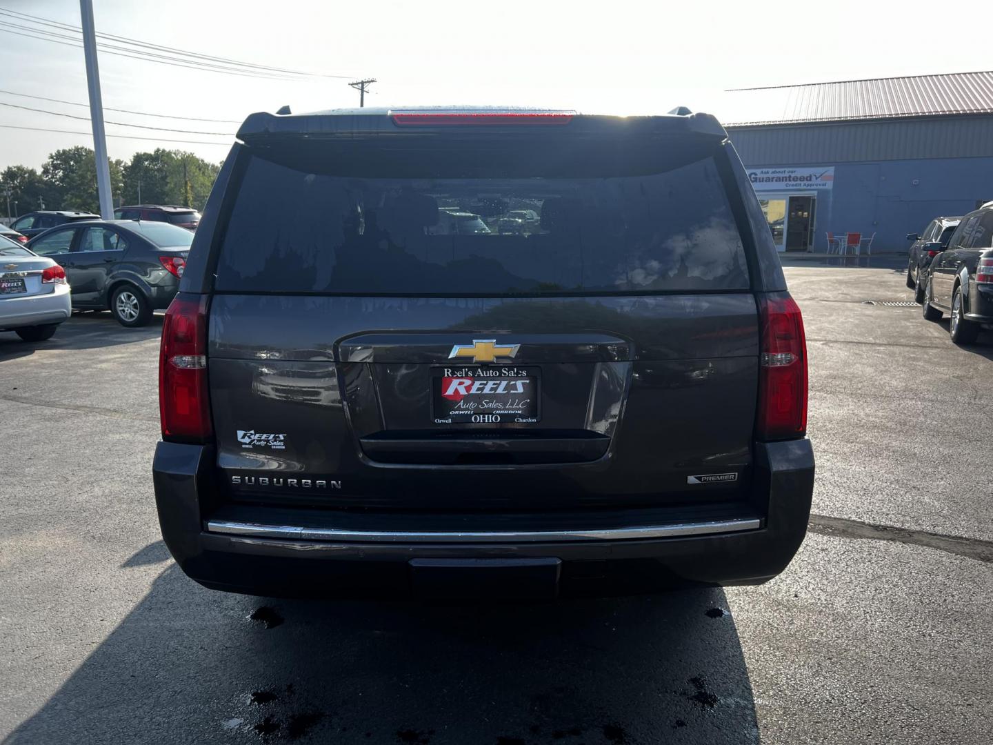 2017 Gray /Black Chevrolet Suburban Premier 4WD (1GNSKJKCXHR) with an 5.3L V8 OHV 16V engine, 6-Speed Automatic transmission, located at 547 E. Main St., Orwell, OH, 44076, (440) 437-5893, 41.535435, -80.847855 - Photo#9