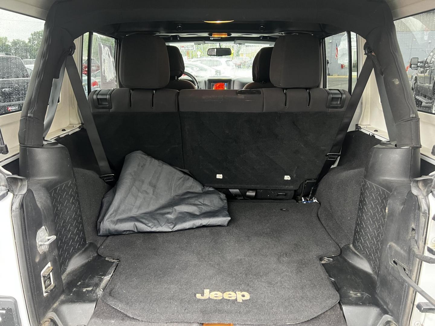 2014 White /Black Jeep Wrangler Unlimited Sport 4WD (1C4BJWDG3EL) with an 3.6L V6 DOHC 24V engine, 5 Speed Auto transmission, located at 547 E. Main St., Orwell, OH, 44076, (440) 437-5893, 41.535435, -80.847855 - Photo#32