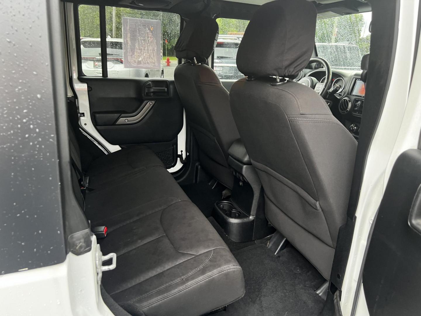 2014 White /Black Jeep Wrangler Unlimited Sport 4WD (1C4BJWDG3EL) with an 3.6L V6 DOHC 24V engine, 5 Speed Auto transmission, located at 547 E. Main St., Orwell, OH, 44076, (440) 437-5893, 41.535435, -80.847855 - Photo#33