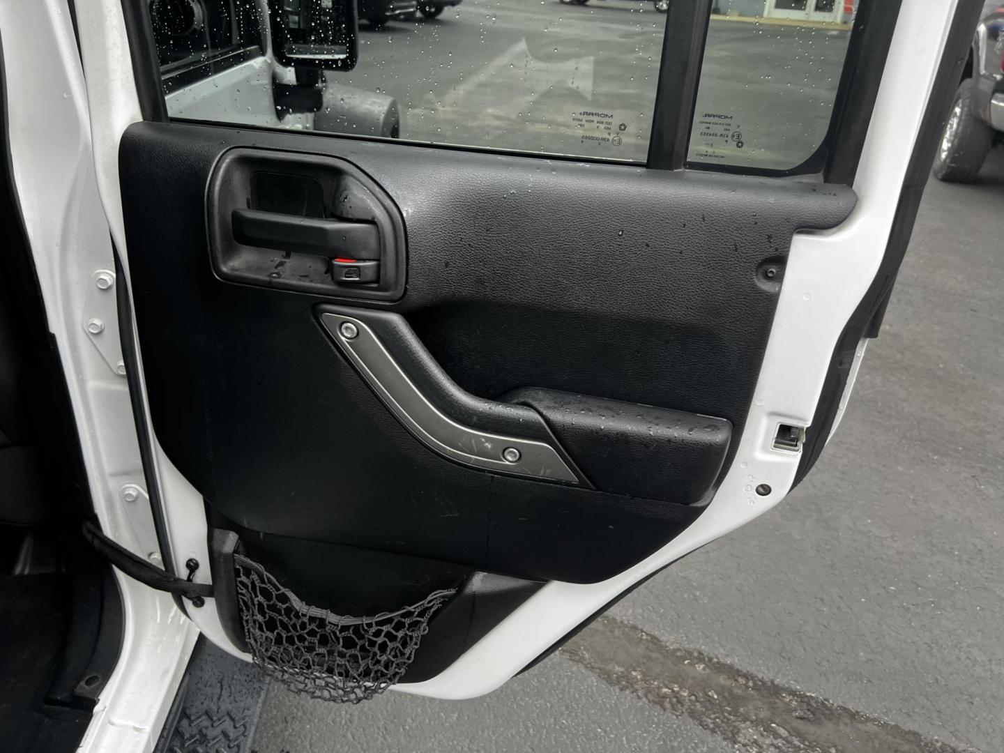 2014 White /Black Jeep Wrangler Unlimited Sport 4WD (1C4BJWDG3EL) with an 3.6L V6 DOHC 24V engine, 5 Speed Auto transmission, located at 547 E. Main St., Orwell, OH, 44076, (440) 437-5893, 41.535435, -80.847855 - Photo#34