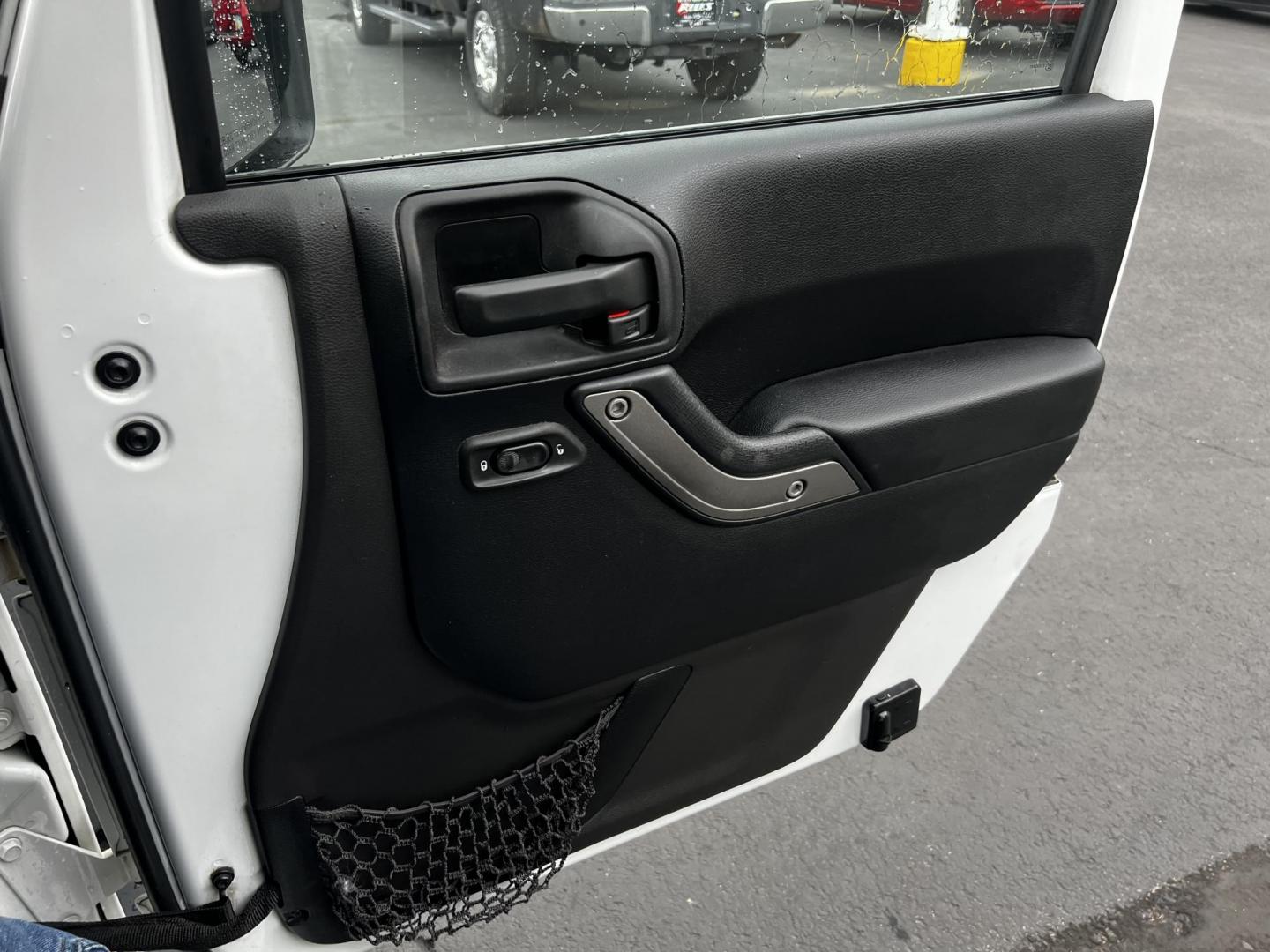 2014 White /Black Jeep Wrangler Unlimited Sport 4WD (1C4BJWDG3EL) with an 3.6L V6 DOHC 24V engine, 5 Speed Auto transmission, located at 547 E. Main St., Orwell, OH, 44076, (440) 437-5893, 41.535435, -80.847855 - Photo#38