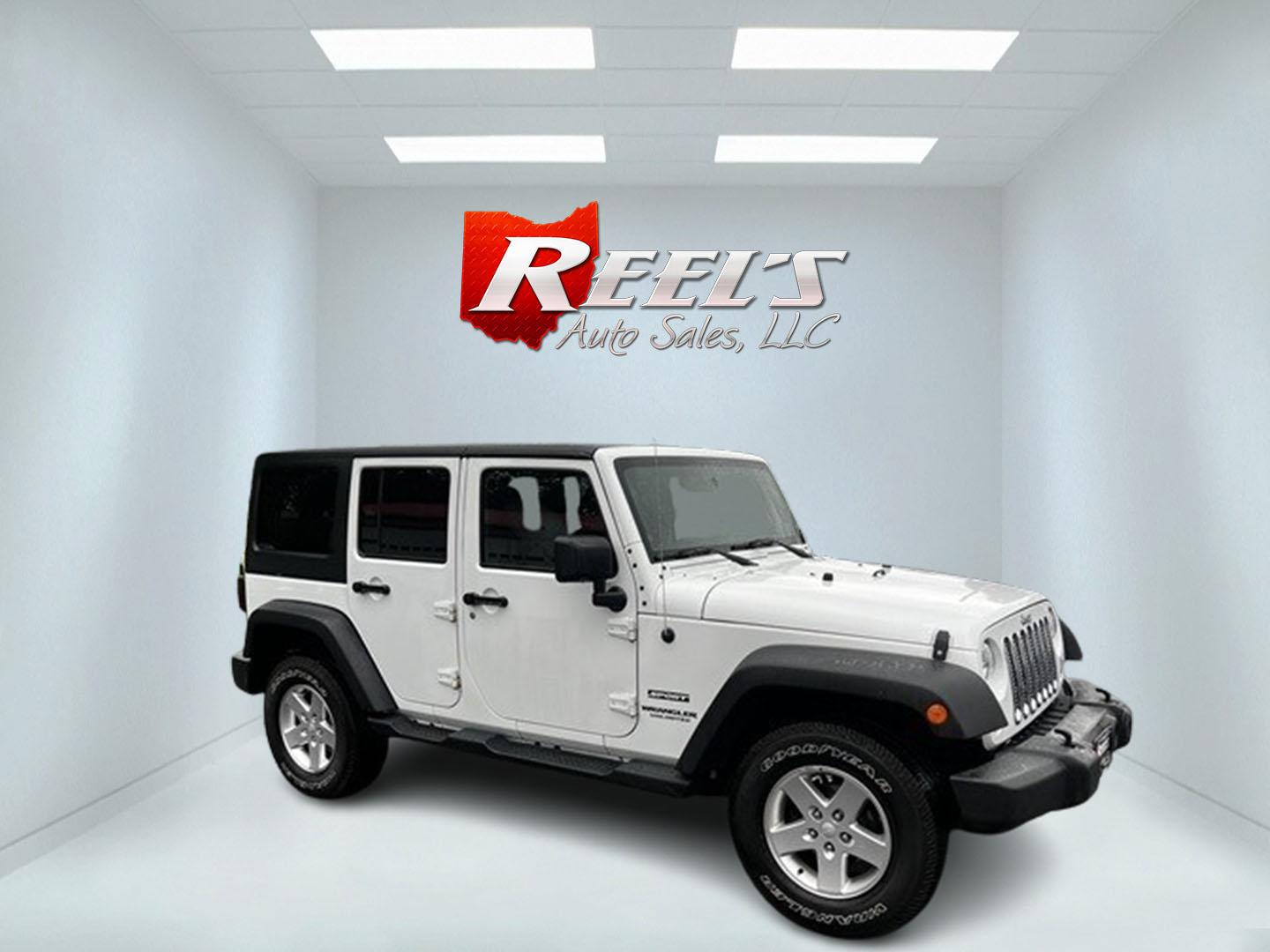 2014 White /Black Jeep Wrangler Unlimited Sport 4WD (1C4BJWDG3EL) with an 3.6L V6 DOHC 24V engine, 5 Speed Auto transmission, located at 547 E. Main St., Orwell, OH, 44076, (440) 437-5893, 41.535435, -80.847855 - Photo#3