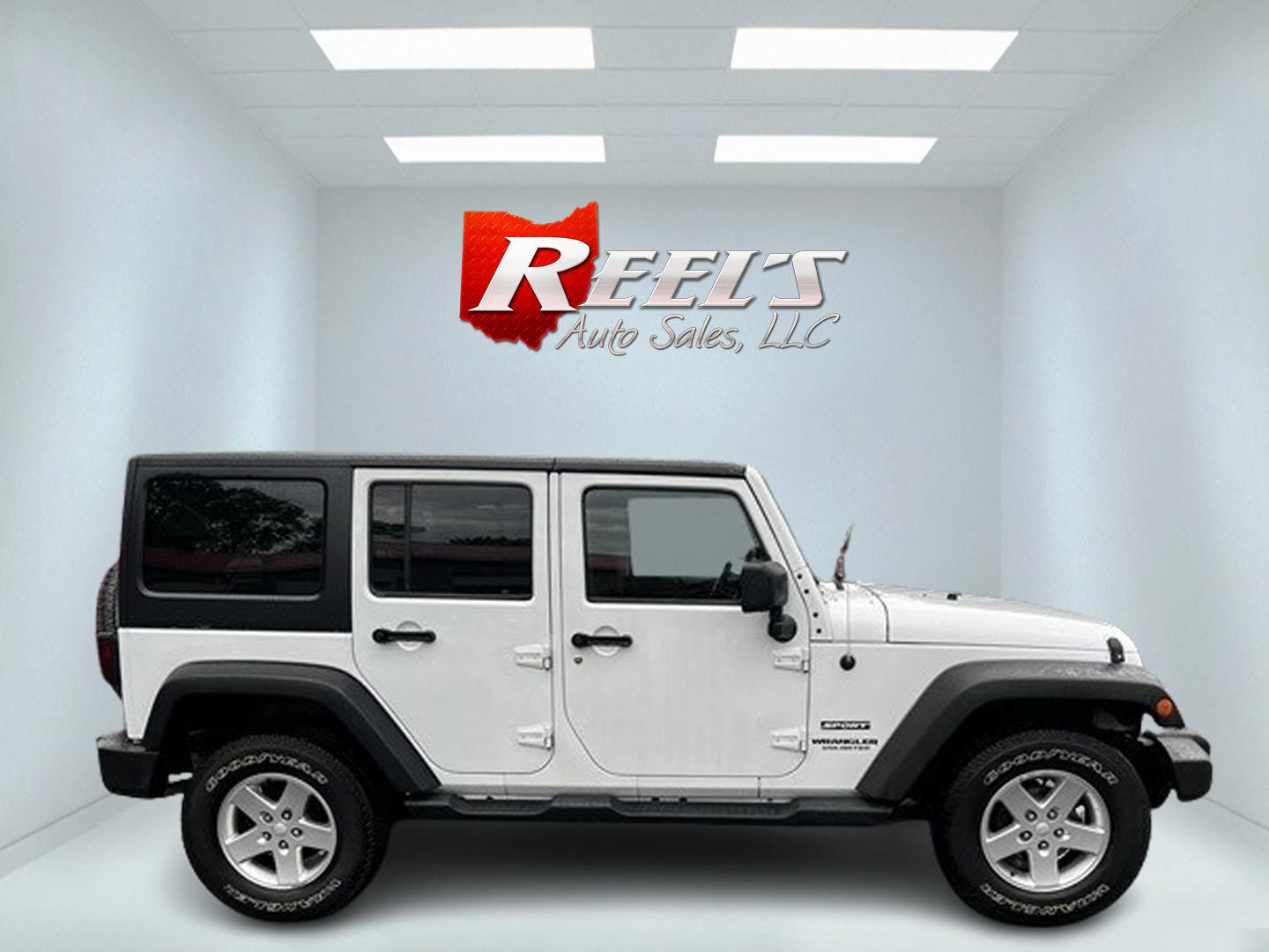 2014 White /Black Jeep Wrangler Unlimited Sport 4WD (1C4BJWDG3EL) with an 3.6L V6 DOHC 24V engine, 5 Speed Auto transmission, located at 547 E. Main St., Orwell, OH, 44076, (440) 437-5893, 41.535435, -80.847855 - Photo#4