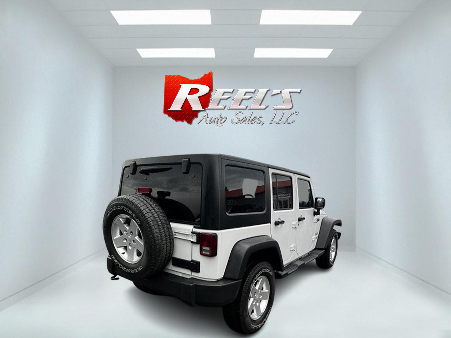 2014 White /Black Jeep Wrangler Unlimited Sport 4WD (1C4BJWDG3EL) with an 3.6L V6 DOHC 24V engine, 5 Speed Auto transmission, located at 547 E. Main St., Orwell, OH, 44076, (440) 437-5893, 41.535435, -80.847855 - Photo#5