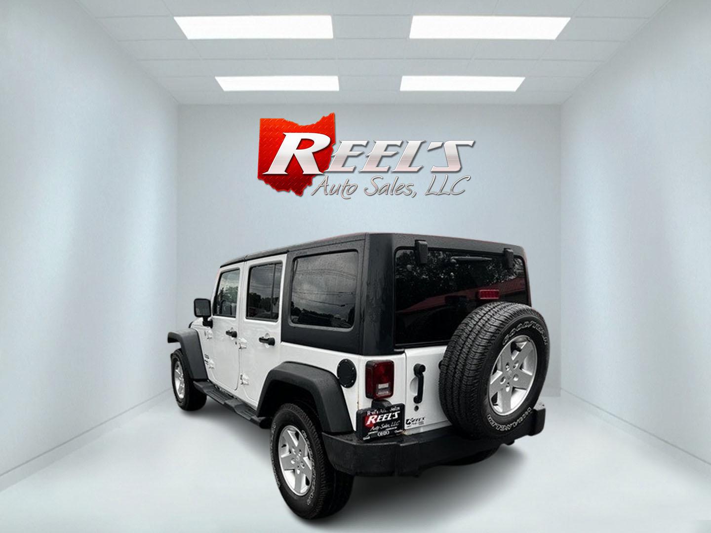 2014 White /Black Jeep Wrangler Unlimited Sport 4WD (1C4BJWDG3EL) with an 3.6L V6 DOHC 24V engine, 5 Speed Auto transmission, located at 547 E. Main St., Orwell, OH, 44076, (440) 437-5893, 41.535435, -80.847855 - Photo#7