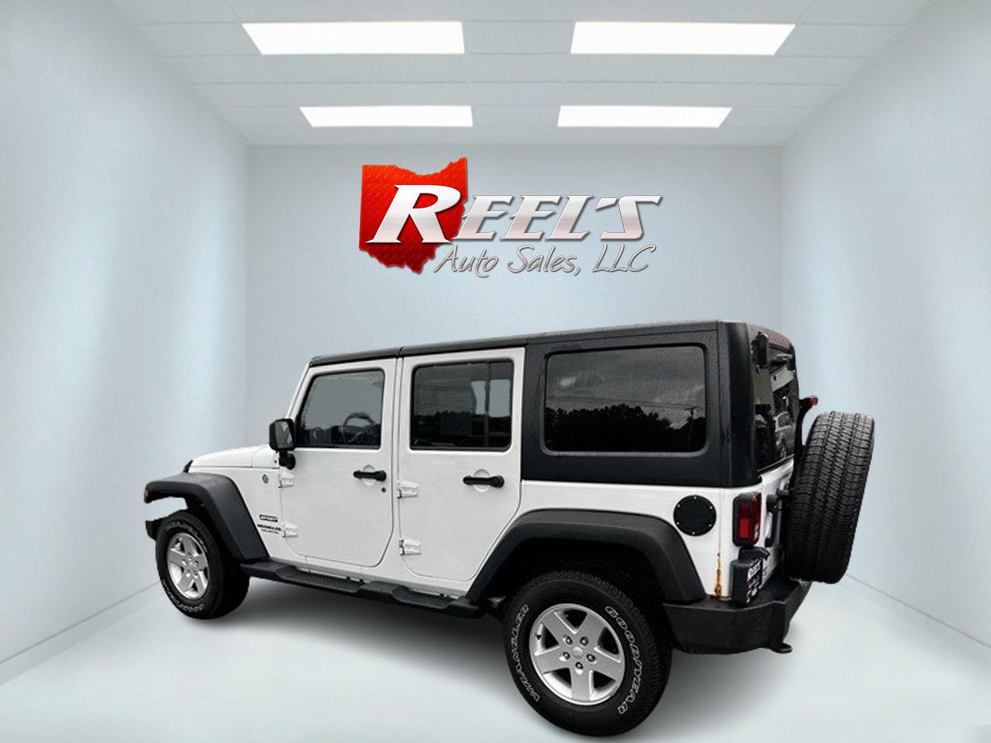 2014 White /Black Jeep Wrangler Unlimited Sport 4WD (1C4BJWDG3EL) with an 3.6L V6 DOHC 24V engine, 5 Speed Auto transmission, located at 547 E. Main St., Orwell, OH, 44076, (440) 437-5893, 41.535435, -80.847855 - Photo#8