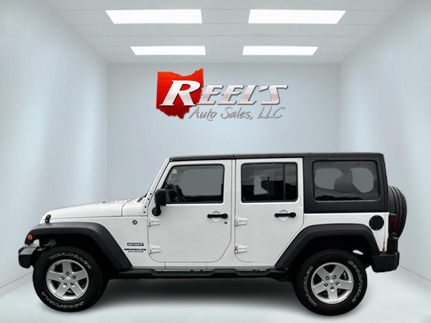 2014 White /Black Jeep Wrangler Unlimited Sport 4WD (1C4BJWDG3EL) with an 3.6L V6 DOHC 24V engine, 5 Speed Auto transmission, located at 547 E. Main St., Orwell, OH, 44076, (440) 437-5893, 41.535435, -80.847855 - Photo#9