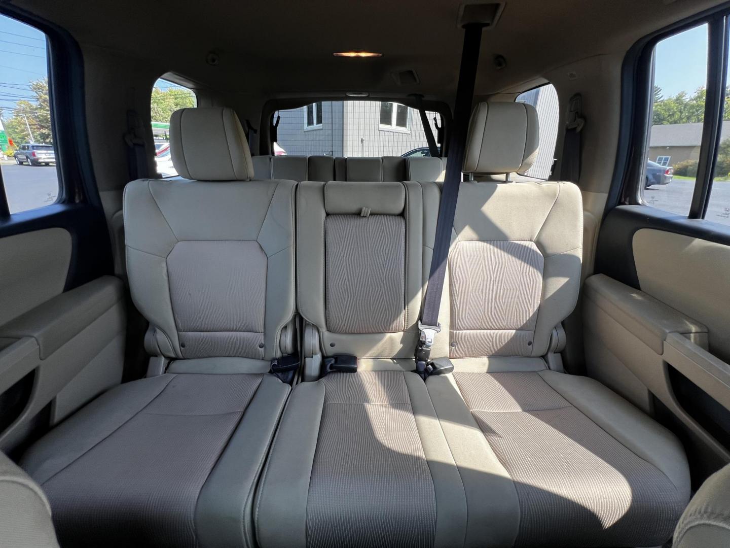 2013 Red /Tan Honda Pilot EX 4WD 5-Spd AT (5FNYF4H45DB) with an 3.5L V6 SOHC 24V engine, 5-Speed Automatic transmission, located at 11115 Chardon Rd. , Chardon, OH, 44024, (440) 214-9705, 41.580246, -81.241943 - Photo#33