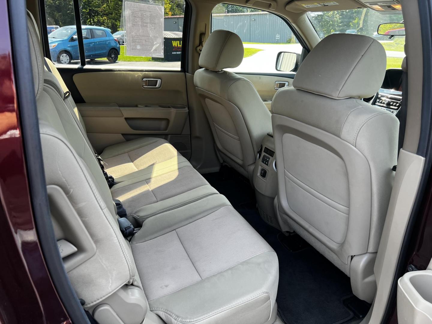 2013 Red /Tan Honda Pilot EX 4WD 5-Spd AT (5FNYF4H45DB) with an 3.5L V6 SOHC 24V engine, 5-Speed Automatic transmission, located at 11115 Chardon Rd. , Chardon, OH, 44024, (440) 214-9705, 41.580246, -81.241943 - Photo#38