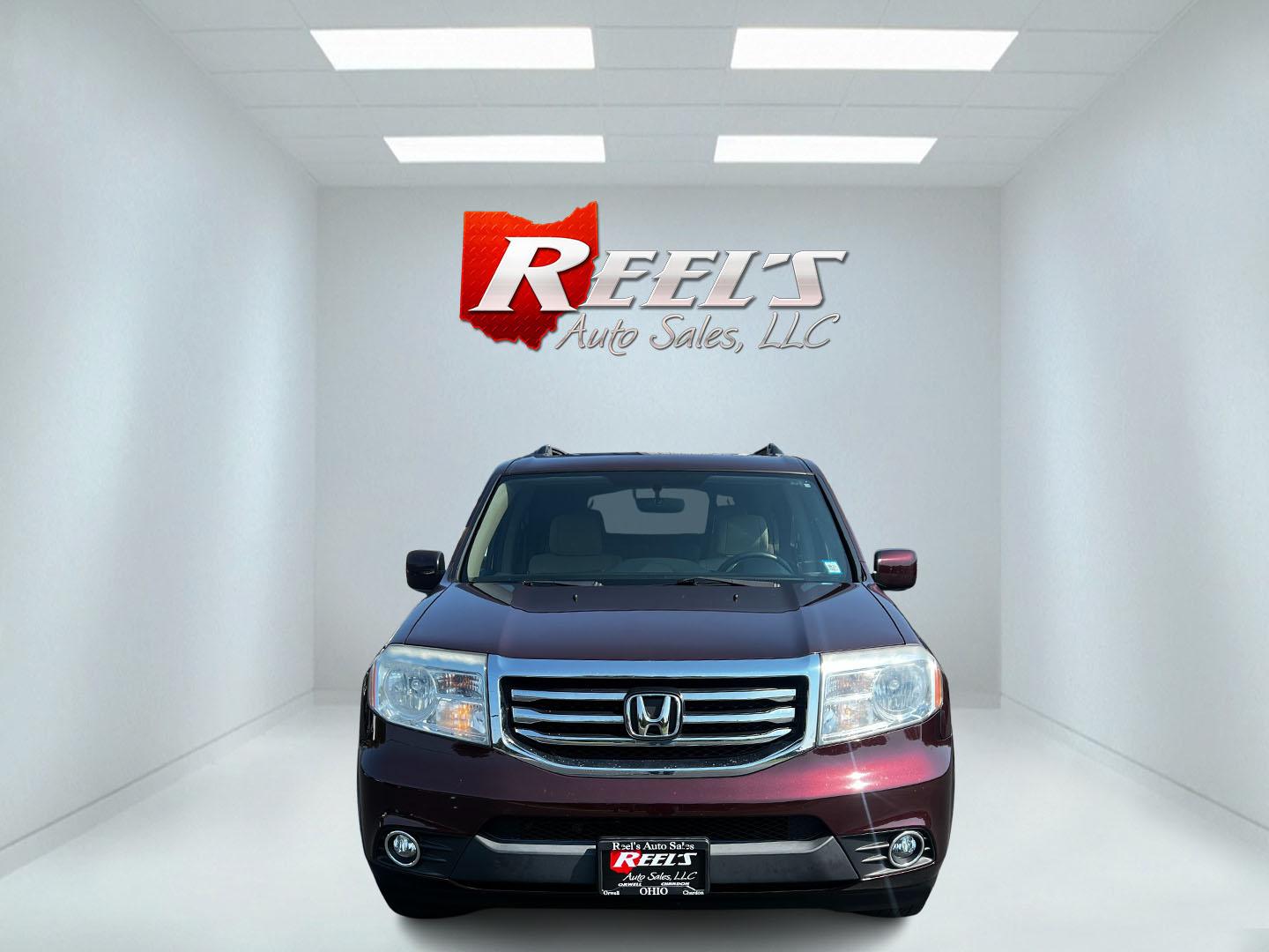 2013 Red /Tan Honda Pilot EX 4WD 5-Spd AT (5FNYF4H45DB) with an 3.5L V6 SOHC 24V engine, 5-Speed Automatic transmission, located at 11115 Chardon Rd. , Chardon, OH, 44024, (440) 214-9705, 41.580246, -81.241943 - Photo#1