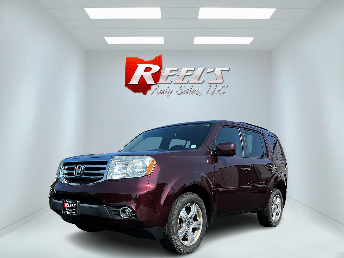 2013 Red /Tan Honda Pilot EX 4WD 5-Spd AT (5FNYF4H45DB) with an 3.5L V6 SOHC 24V engine, 5-Speed Automatic transmission, located at 11115 Chardon Rd. , Chardon, OH, 44024, (440) 214-9705, 41.580246, -81.241943 - Photo#0