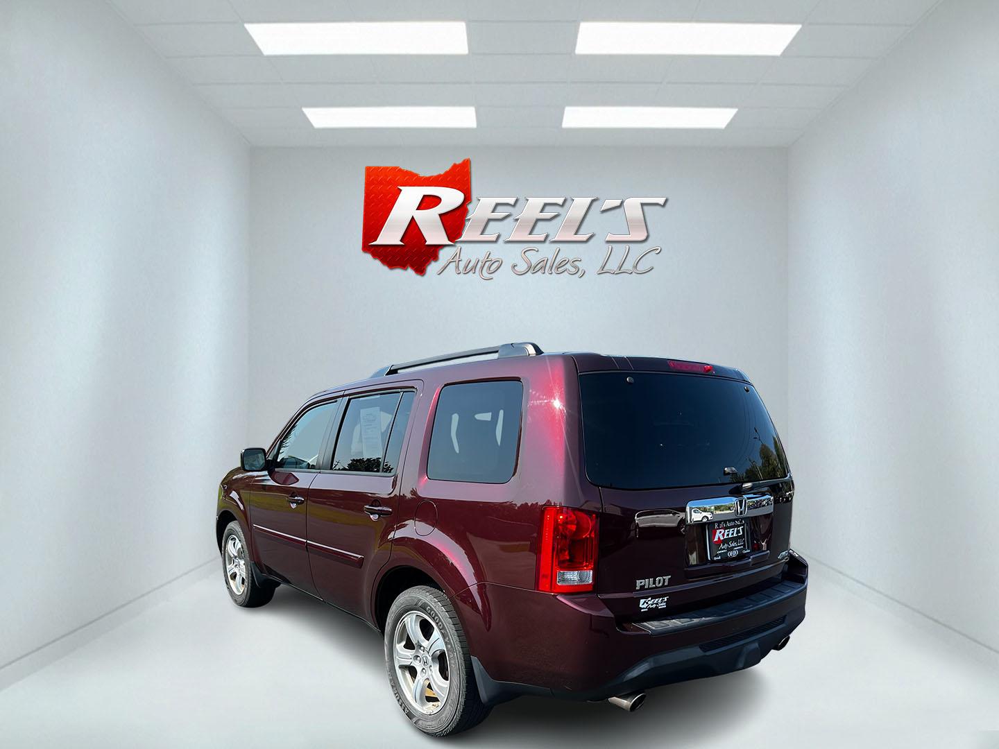 2013 Red /Tan Honda Pilot EX 4WD 5-Spd AT (5FNYF4H45DB) with an 3.5L V6 SOHC 24V engine, 5-Speed Automatic transmission, located at 11115 Chardon Rd. , Chardon, OH, 44024, (440) 214-9705, 41.580246, -81.241943 - Photo#7