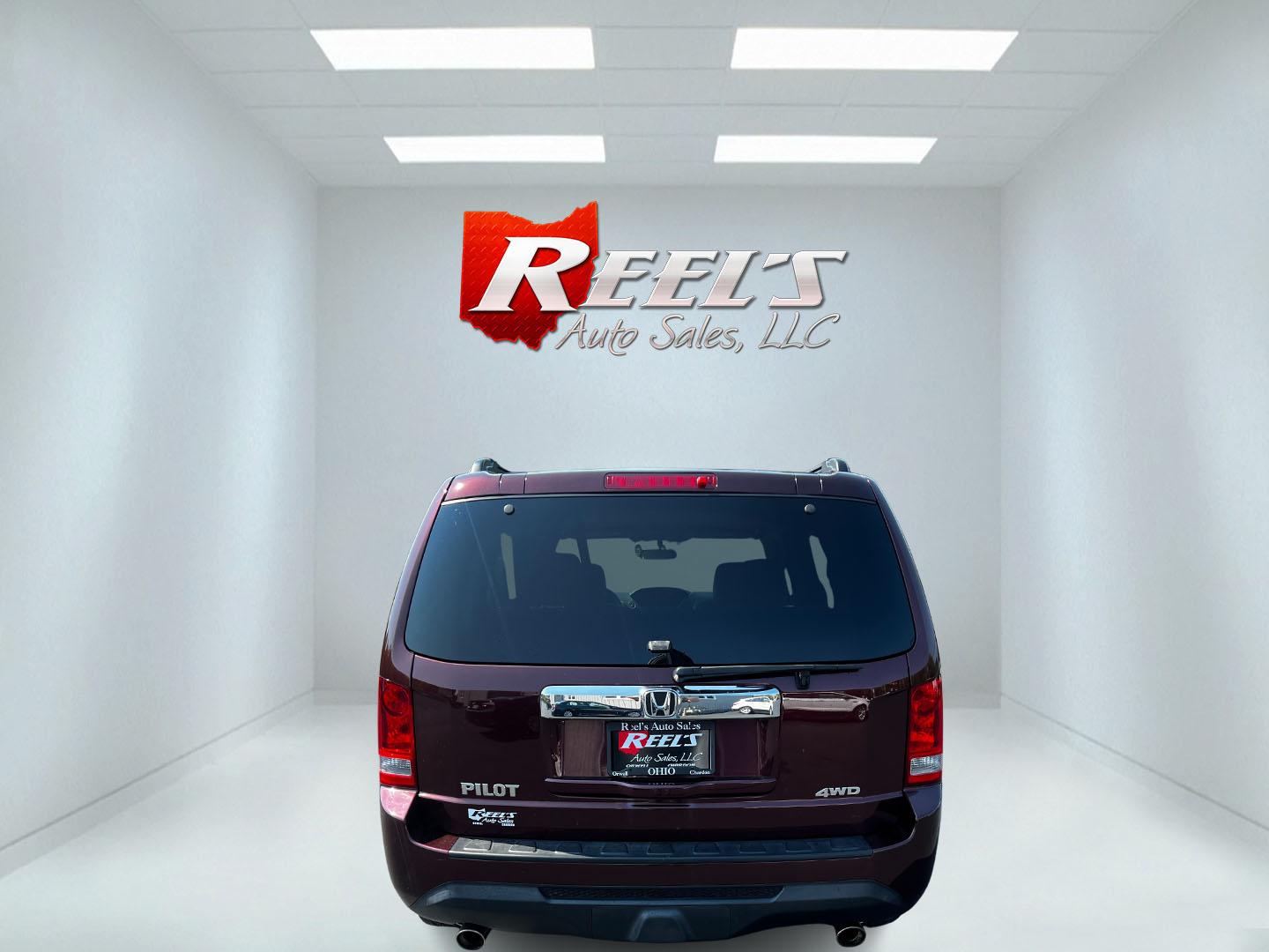 2013 Red /Tan Honda Pilot EX 4WD 5-Spd AT (5FNYF4H45DB) with an 3.5L V6 SOHC 24V engine, 5-Speed Automatic transmission, located at 11115 Chardon Rd. , Chardon, OH, 44024, (440) 214-9705, 41.580246, -81.241943 - Photo#6