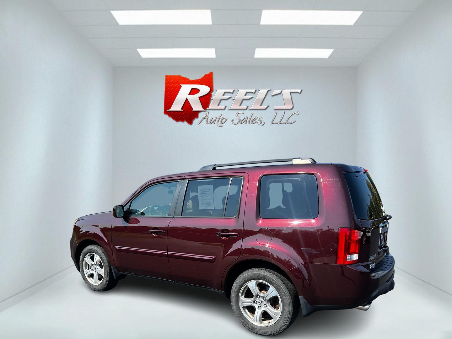 2013 Red /Tan Honda Pilot EX 4WD 5-Spd AT (5FNYF4H45DB) with an 3.5L V6 SOHC 24V engine, 5-Speed Automatic transmission, located at 11115 Chardon Rd. , Chardon, OH, 44024, (440) 214-9705, 41.580246, -81.241943 - Photo#8