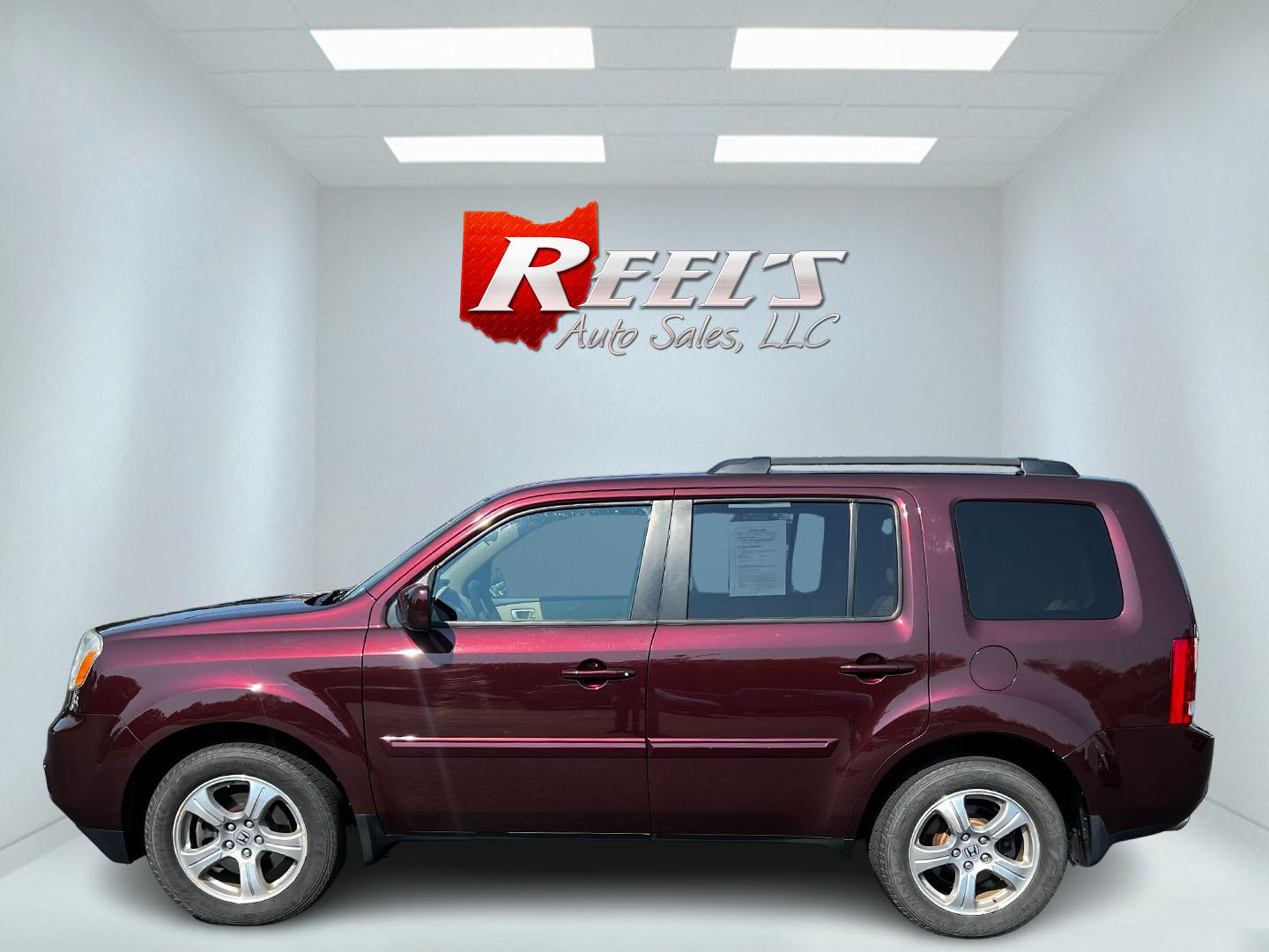 2013 Red /Tan Honda Pilot EX 4WD 5-Spd AT (5FNYF4H45DB) with an 3.5L V6 SOHC 24V engine, 5-Speed Automatic transmission, located at 11115 Chardon Rd. , Chardon, OH, 44024, (440) 214-9705, 41.580246, -81.241943 - Photo#9