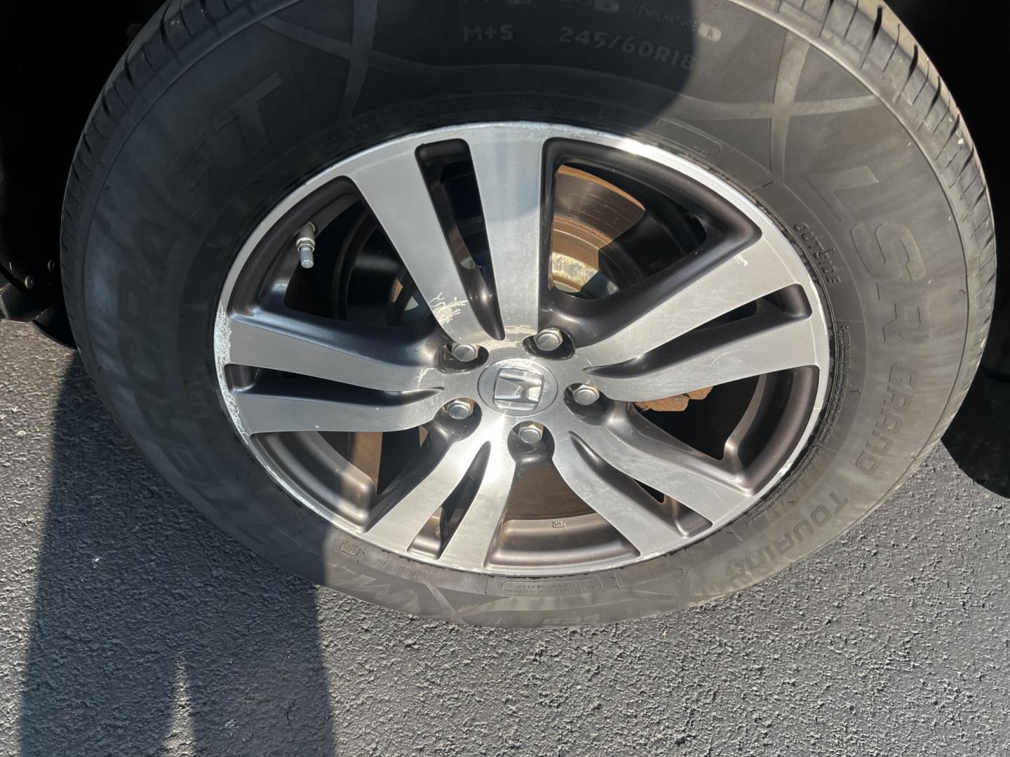 2017 Black /Gray Honda Pilot EX 4WD (5FNYF6H39HB) with an 3.5L V6 SOHC 24V engine, 6 Speed Auto transmission, located at 547 E. Main St., Orwell, OH, 44076, (440) 437-5893, 41.535435, -80.847855 - This 2017 Honda Pilot EX 4WD is a versatile and family-friendly SUV equipped with a 3.5L EarthDreams V6 engine and a 6-speed automatic transmission, offering a smooth driving experience and an efficient highway fuel economy of 26 MPG. It features LED daytime running lights and dusk-sensing headlight - Photo#24