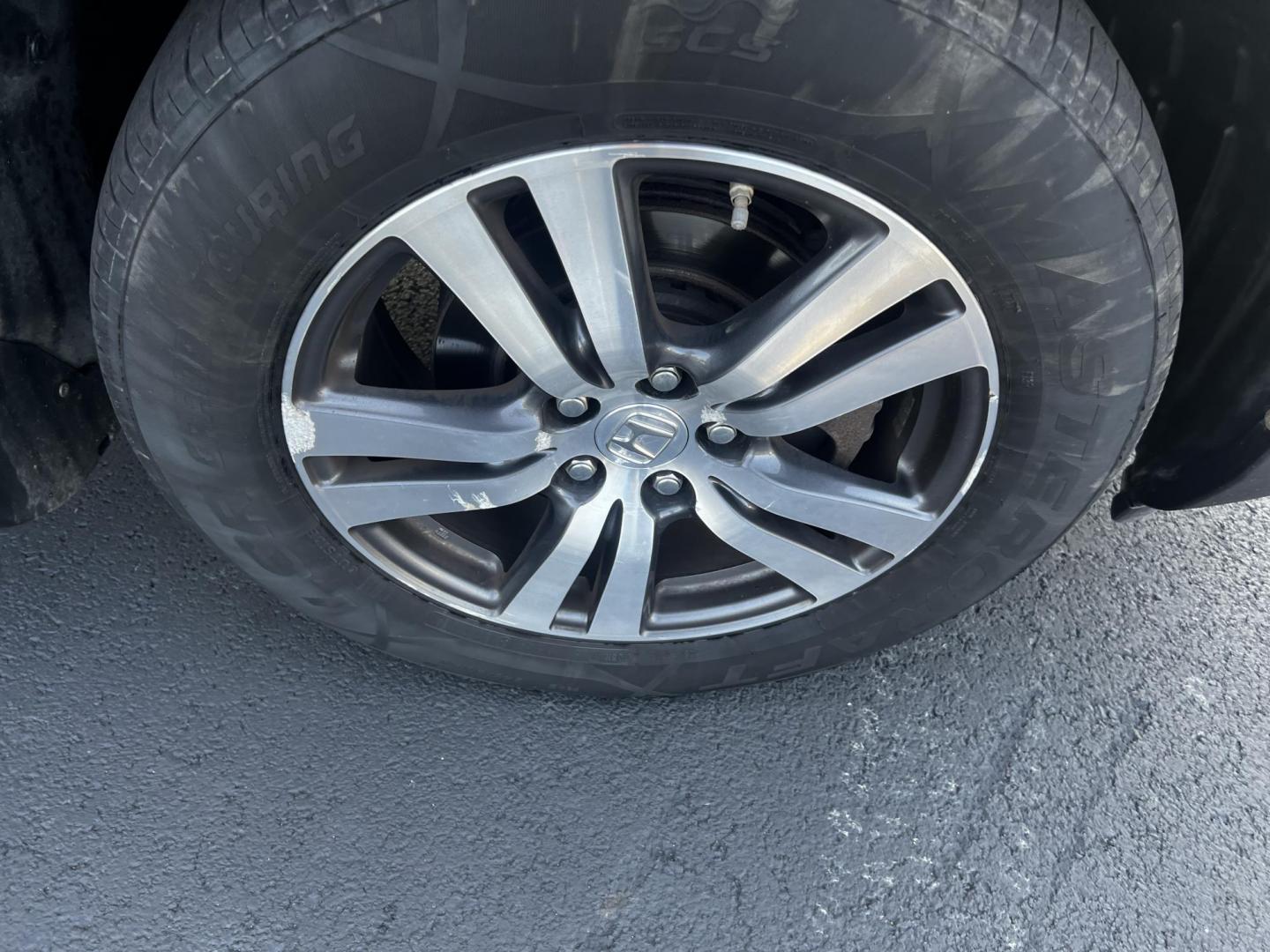 2017 Black /Gray Honda Pilot EX 4WD (5FNYF6H39HB) with an 3.5L V6 SOHC 24V engine, 6 Speed Auto transmission, located at 547 E. Main St., Orwell, OH, 44076, (440) 437-5893, 41.535435, -80.847855 - This 2017 Honda Pilot EX 4WD is a versatile and family-friendly SUV equipped with a 3.5L EarthDreams V6 engine and a 6-speed automatic transmission, offering a smooth driving experience and an efficient highway fuel economy of 26 MPG. It features LED daytime running lights and dusk-sensing headlight - Photo#21